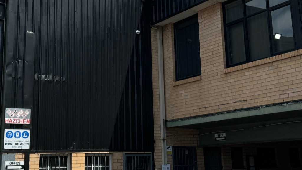 Facility Exterior Painted: Zero Production Downtime in 6 Days